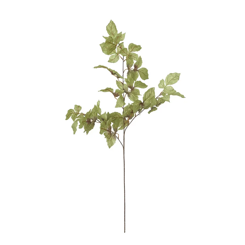 Green artificial autumn leaf stem of small oval leaves on a fine woody branch