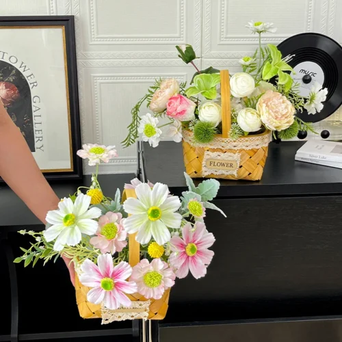Two baskets, held artificial flower basket trimmed with lace and a small flower tag, styled in a room setting