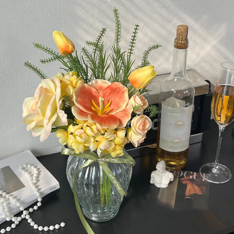 Peach artificial flower posy of hand-tied silk blooms and foliage, styled in a room setting