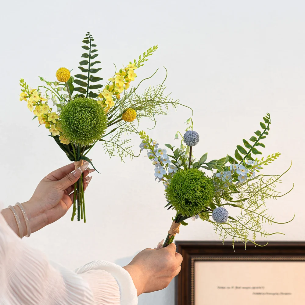 Artificial freesia and green dianthus posy built round one tight green dianthus head with the full colour range