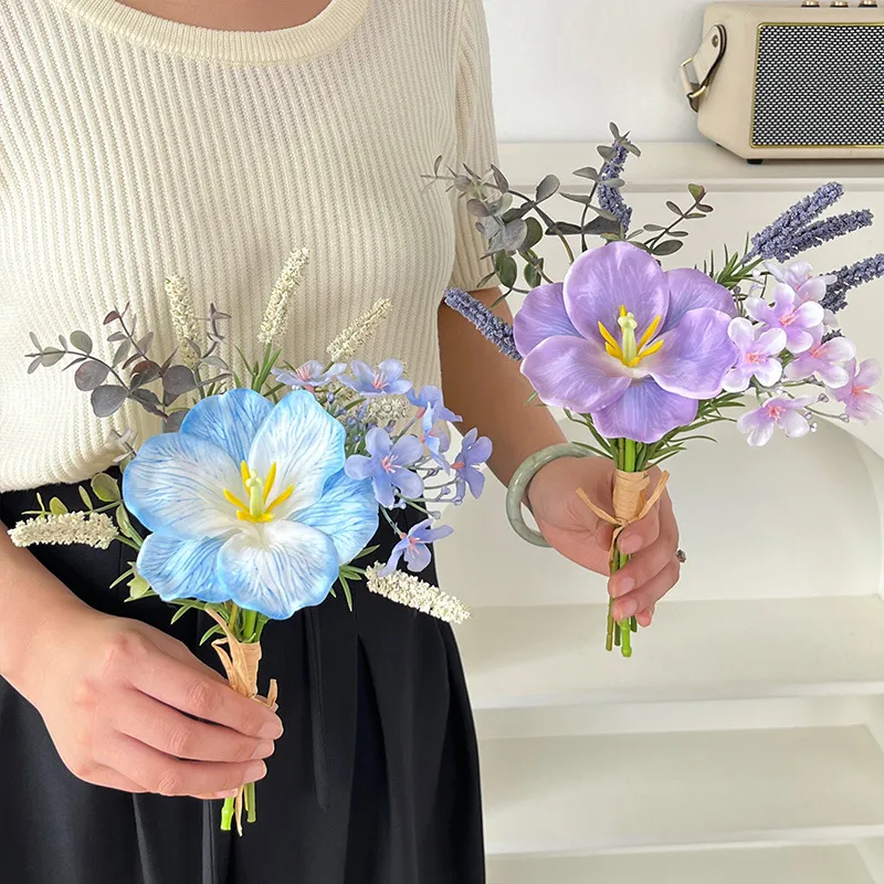 Artificial hibiscus flower bunch tied with raffia round one large trumpet bloom with the full colour range