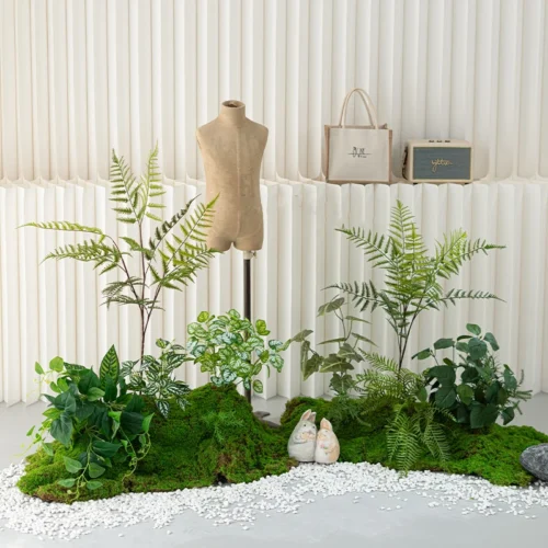 Grouped artificial moss arrangement on a shaped moss base with mixed foliage with the full colour range