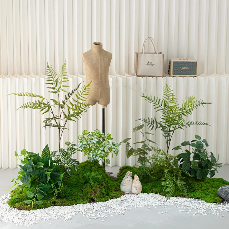 Grouped artificial moss arrangement on a shaped moss base with mixed foliage with the full colour range