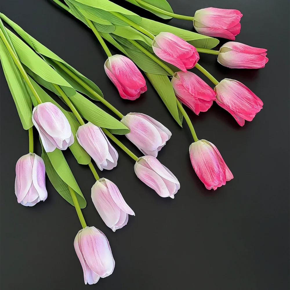 Pink artificial tulip bunch of ten stems, ten stems tied as a market bunch, styled on a table top