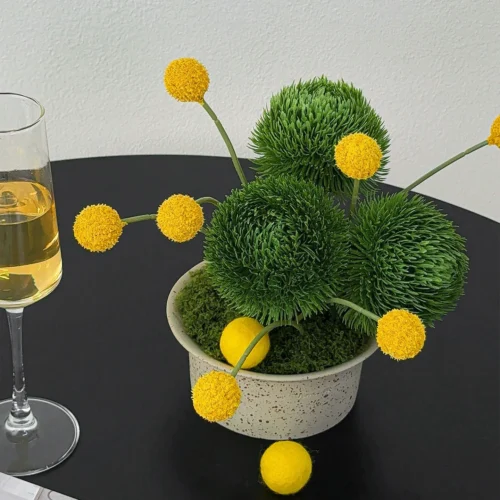 Speckled stone bowl artificial flower arrangement in a white vase, two flowers only, in a choice of four vessels, styled in a room setting