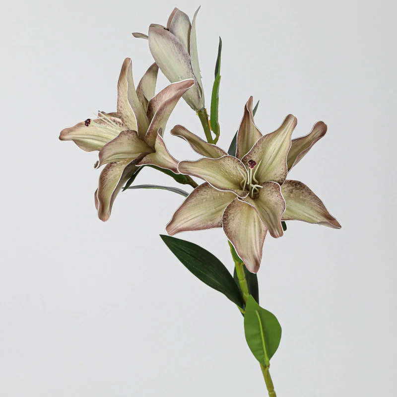 Dusty mauve artificial lily stem carrying two open flowers and one closed bud