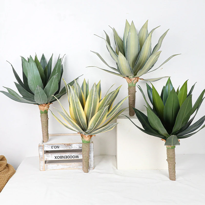 Four sizes together faux agave plant on a jute-wrapped trunk that plants straight into a pot with the full colour range