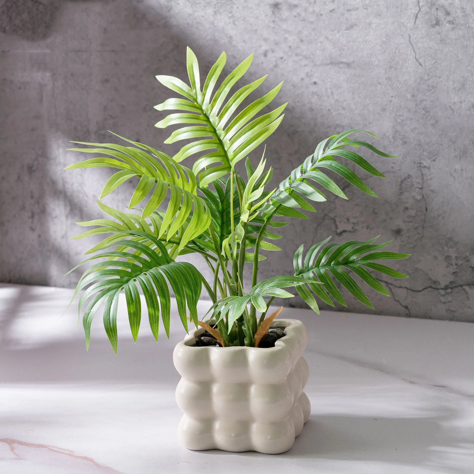 Parlour palm small potted artificial plant finished in a glazed ceramic pot
